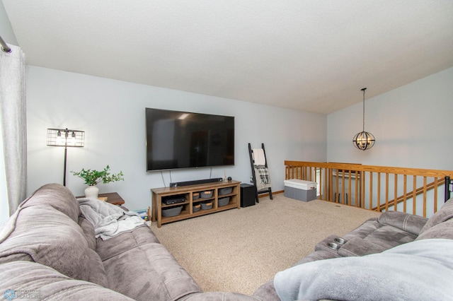 carpeted living room with a textured ceiling and lofted ceiling