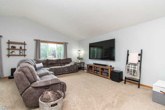 living room with lofted ceiling and light colored carpet