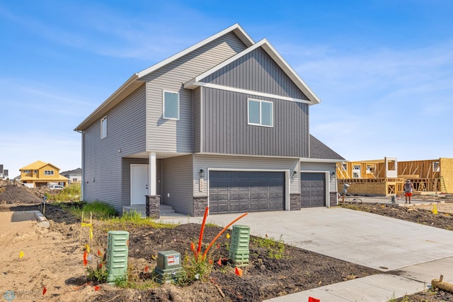 view of front of property featuring a garage