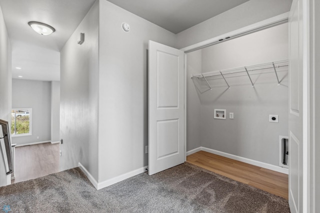 washroom featuring washer hookup, hardwood / wood-style floors, and hookup for an electric dryer