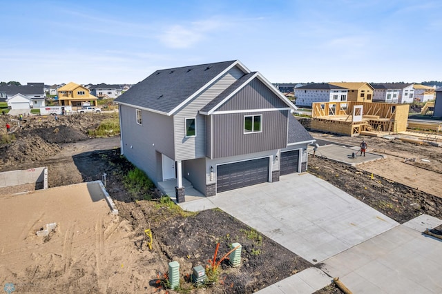 exterior space featuring a garage and a deck