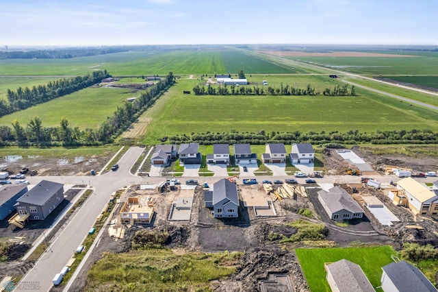 birds eye view of property featuring a rural view