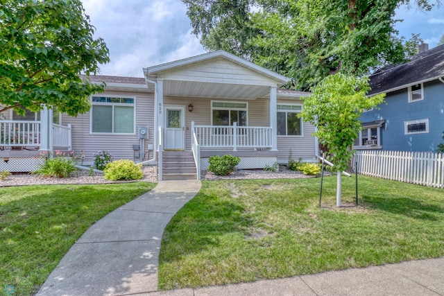 view of front of home featuring a front lawn and a porch