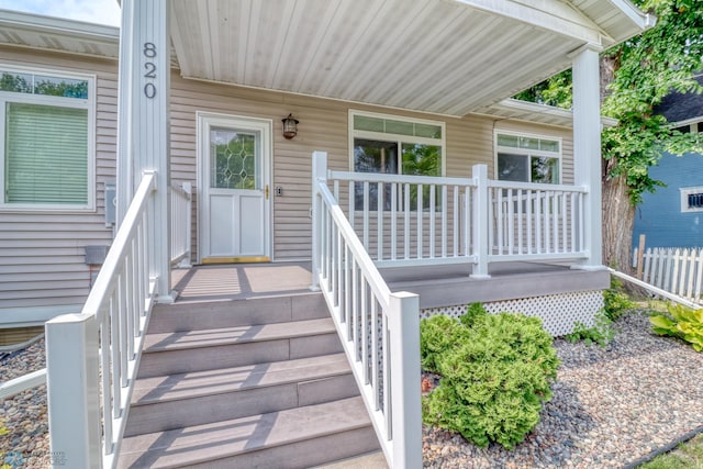 doorway to property featuring a porch