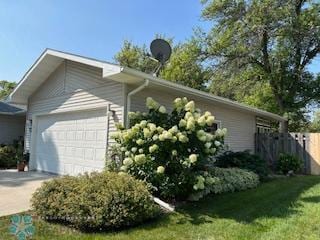 view of property exterior featuring a garage