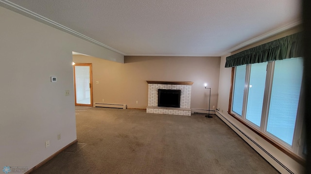 unfurnished living room featuring a fireplace, carpet floors, ornamental molding, and a baseboard heating unit