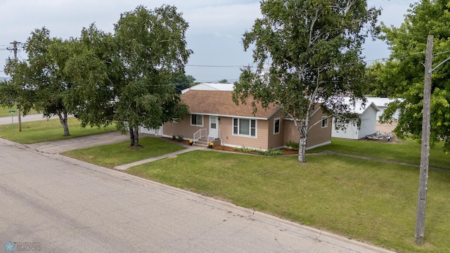 single story home with a front lawn