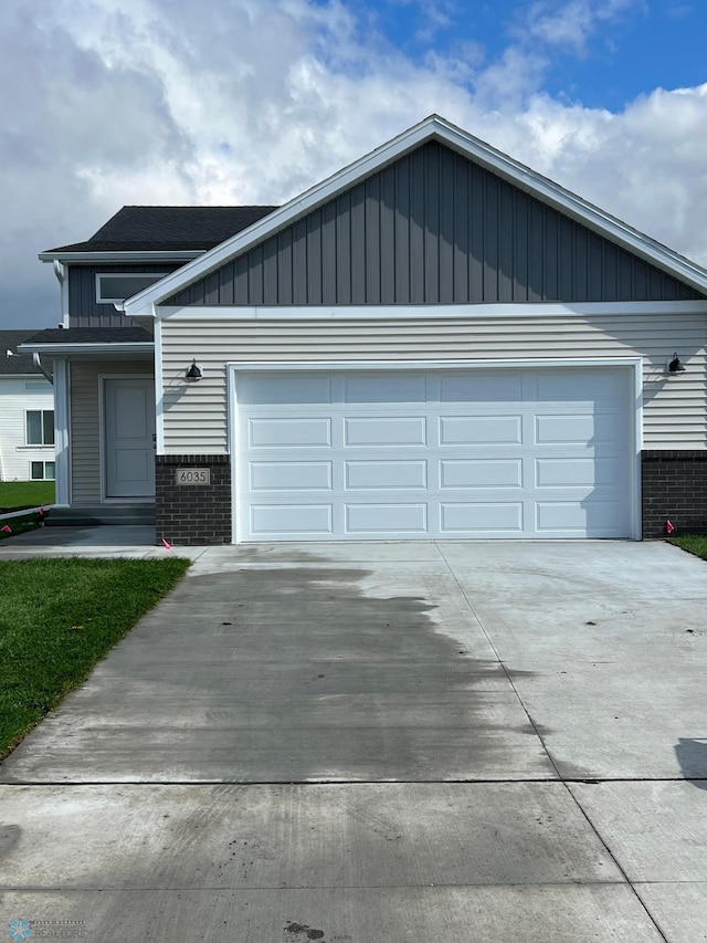 view of front of home with a garage