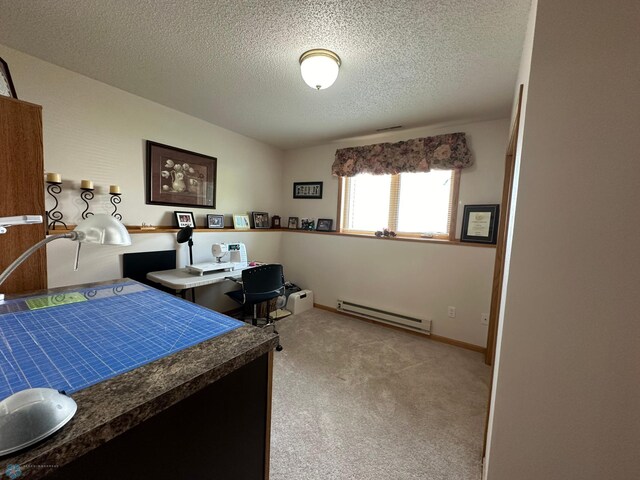 bedroom with a baseboard radiator, light colored carpet, and a textured ceiling