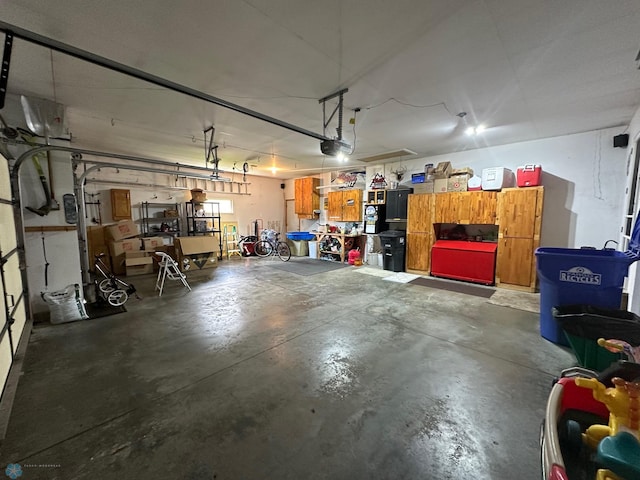 garage featuring a garage door opener