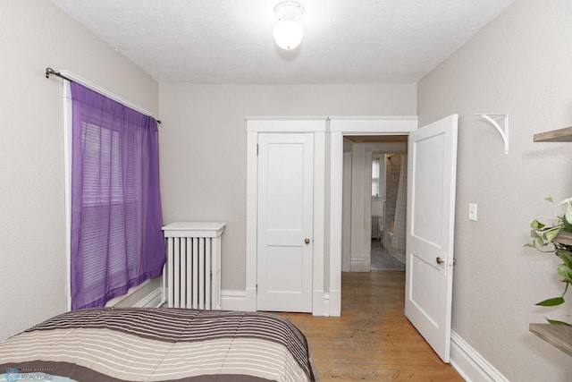 bedroom featuring light hardwood / wood-style floors