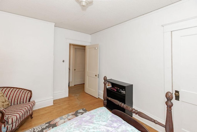 bedroom with light wood-type flooring