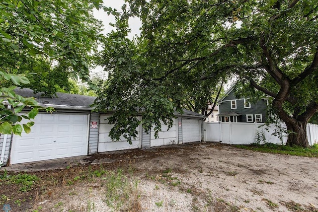 exterior space with a garage