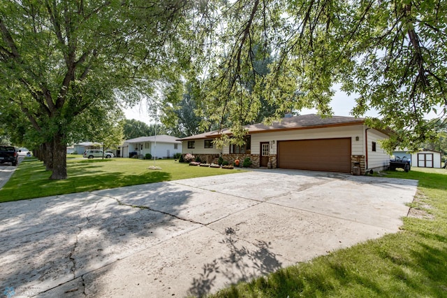 single story home with a front yard and a garage