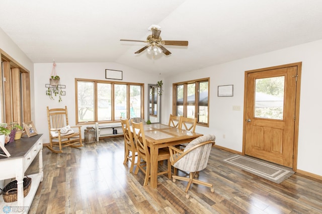 dining area featuring ceiling fan, lofted ceiling, and dark hardwood / wood-style flooring