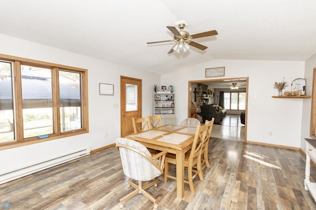 dining space featuring ceiling fan, vaulted ceiling, wood-type flooring, and a baseboard radiator