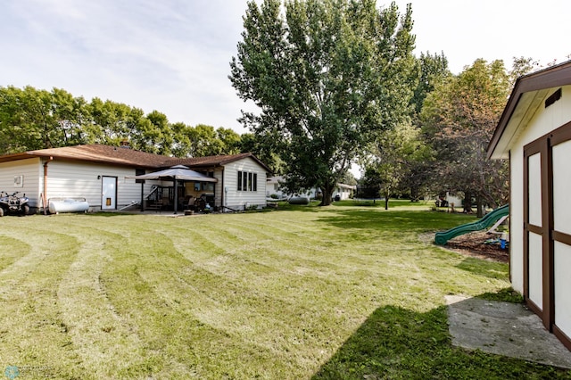 view of yard with a playground