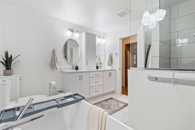 bathroom featuring vanity and tile patterned floors