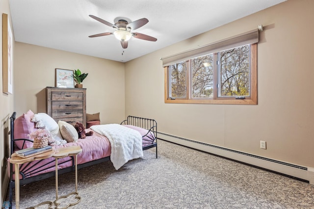 carpeted bedroom featuring a baseboard radiator and ceiling fan