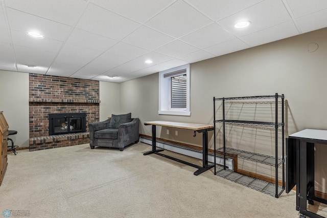 interior space with a brick fireplace and light colored carpet