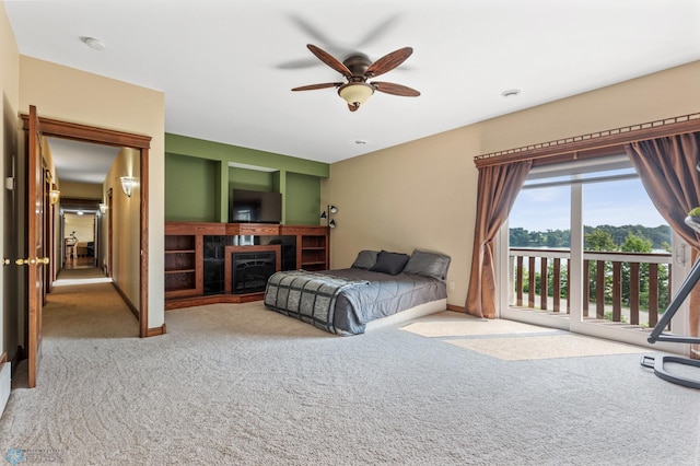 bedroom featuring ceiling fan and carpet flooring