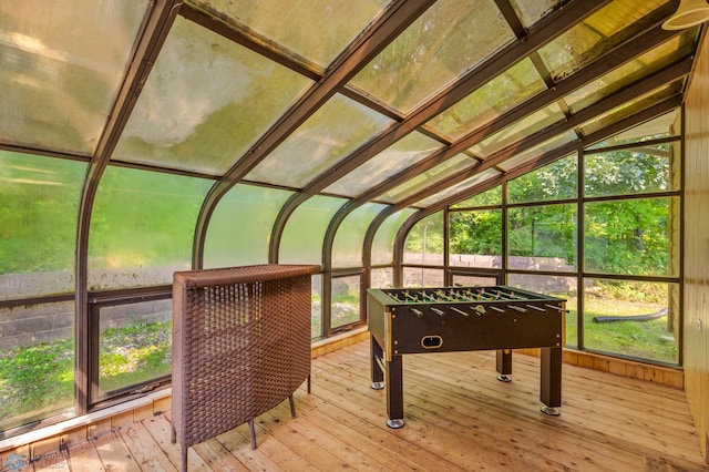 sunroom / solarium with lofted ceiling