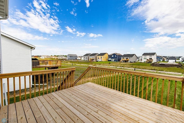 deck featuring a lawn