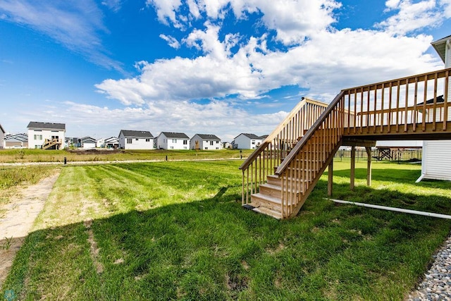 view of yard with a deck