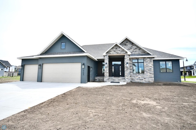 view of front of property with a garage