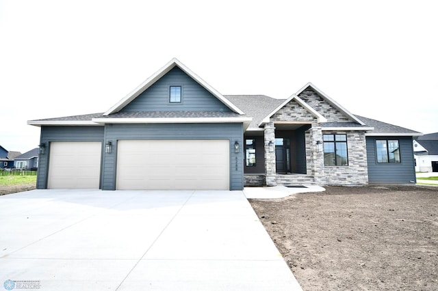 view of front of property featuring a garage