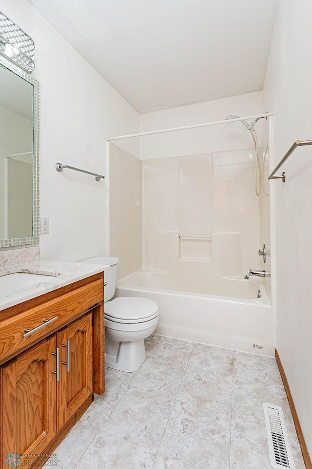 full bathroom featuring vanity, toilet, and shower / bathtub combination