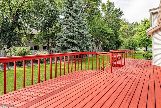 wooden deck with a yard