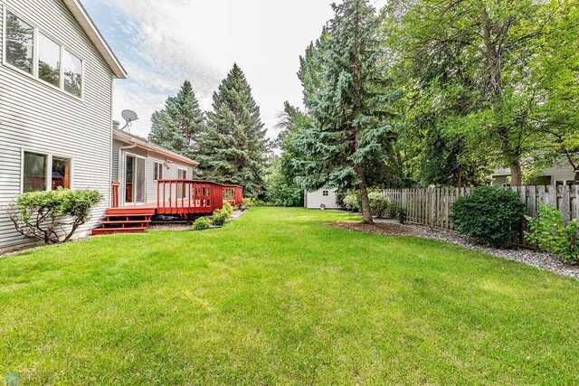 view of yard with a deck