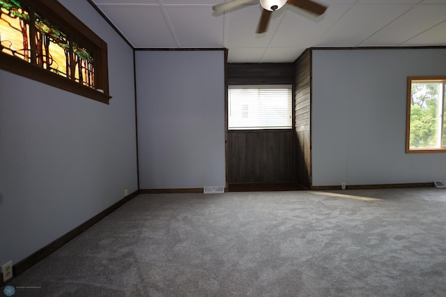 carpeted empty room with ceiling fan