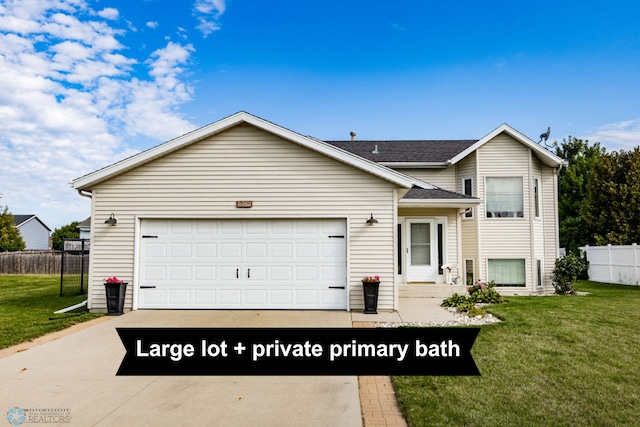 view of front facade with a front lawn and a garage