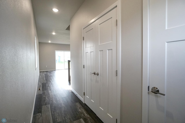 hall with dark hardwood / wood-style floors