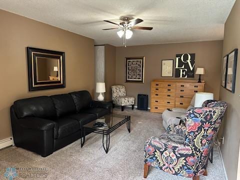 carpeted living room with ceiling fan