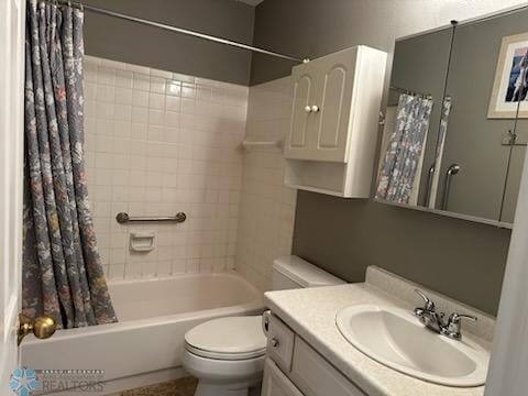 full bathroom with shower / bathtub combination with curtain, toilet, and vanity