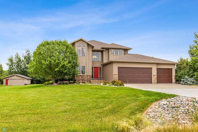 view of front facade featuring a garage and a front lawn