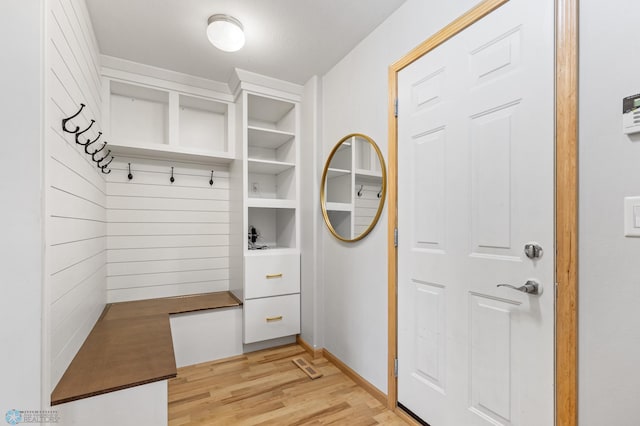 mudroom with light hardwood / wood-style floors