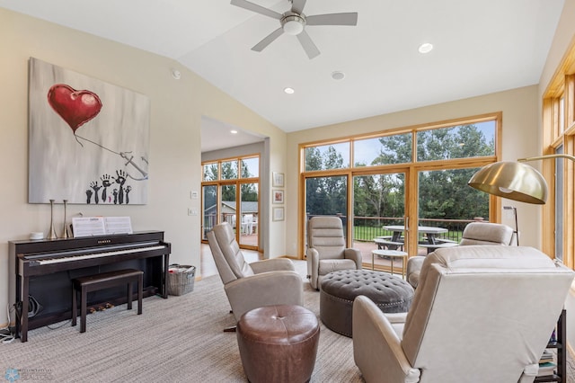 living room with lofted ceiling, carpet, and ceiling fan