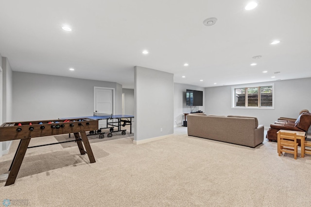 game room featuring light carpet