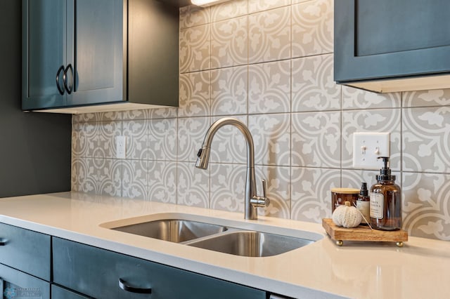 kitchen featuring sink and decorative backsplash