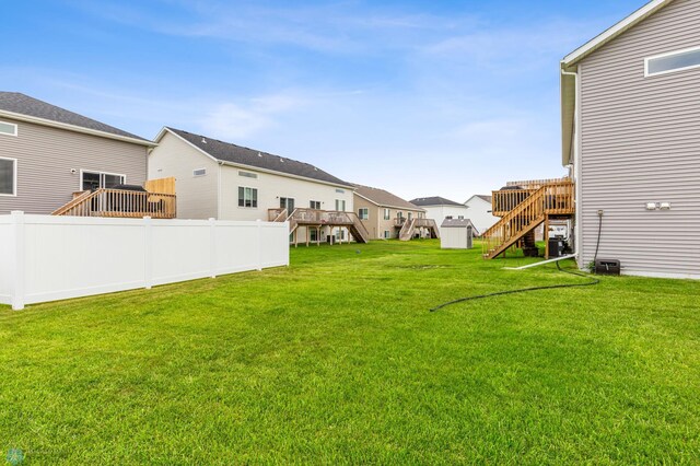 view of yard with a deck