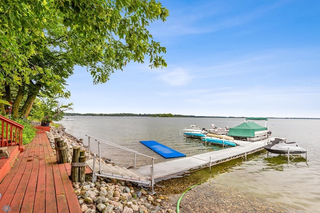 dock area with a water view