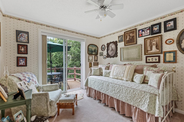 bedroom with light carpet, access to outside, ceiling fan, ornamental molding, and a textured ceiling