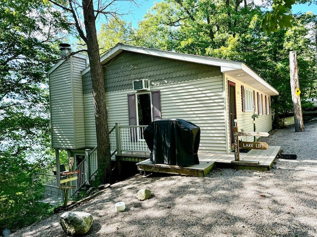 exterior space featuring a wooden deck