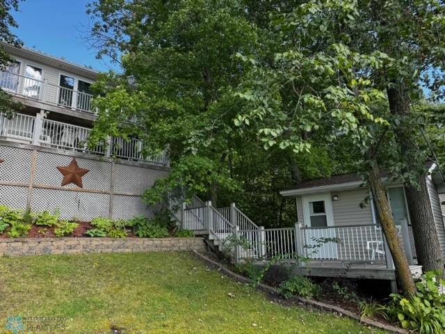 view of yard featuring a wooden deck