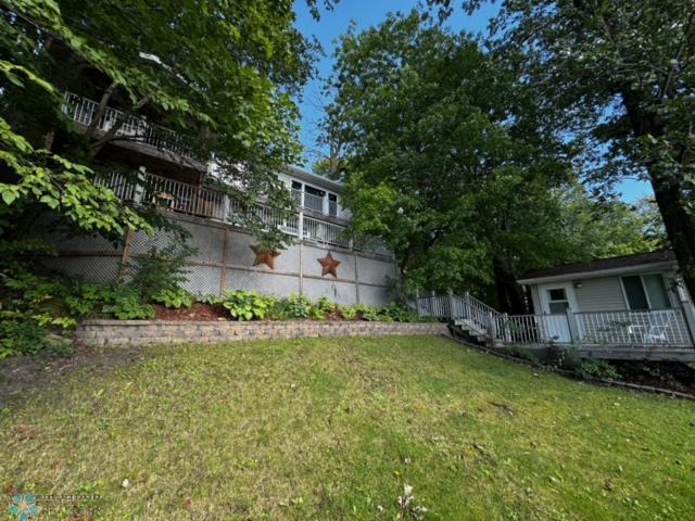 view of yard with a wooden deck