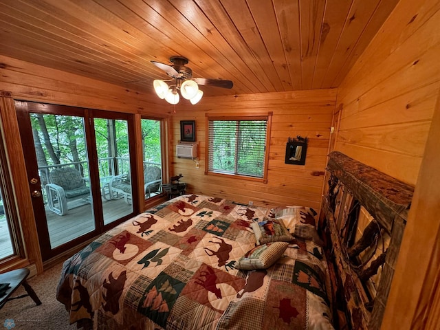 bedroom featuring ceiling fan, cooling unit, wooden walls, wooden ceiling, and access to exterior